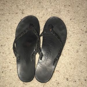 Braided rainbow flip flops black